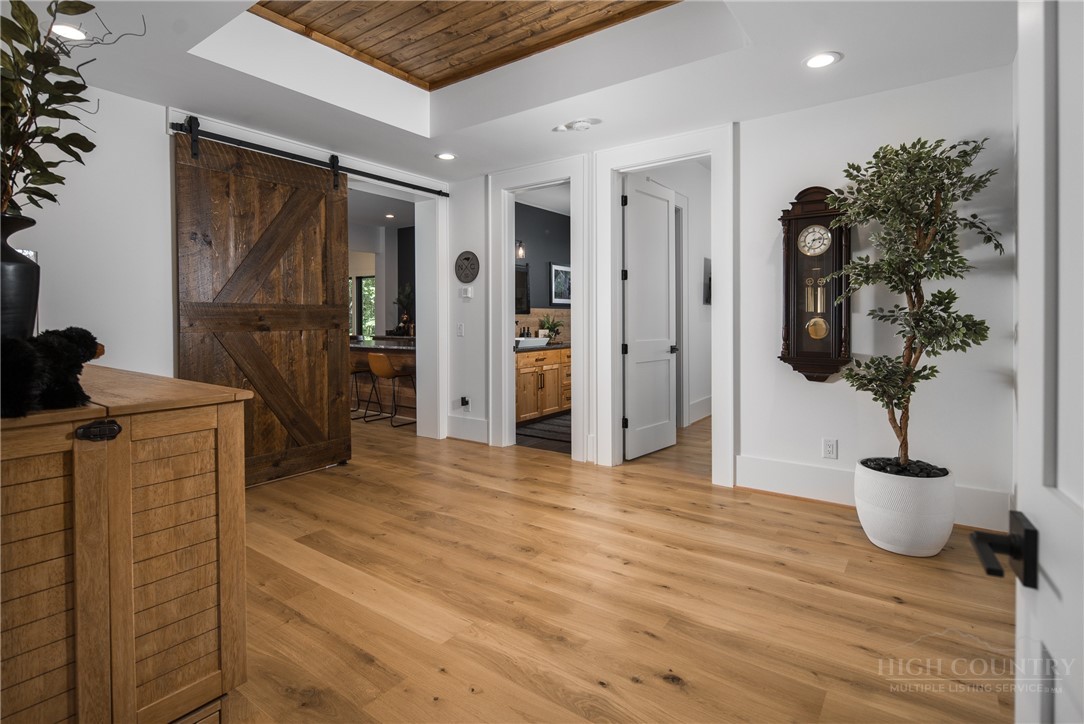 1236 Ninebark Road Boone, NC 28607 - Photo 28 of 50 a view of hallway with furniture and wooden floor