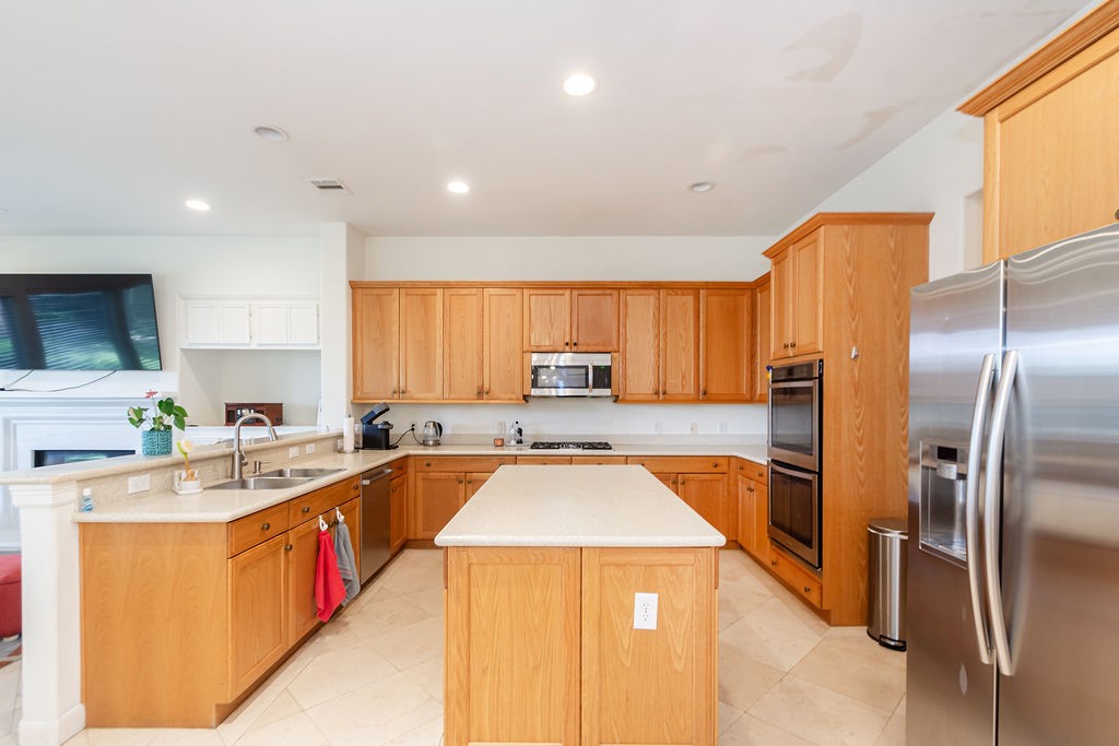 3011 Bonnebridge Way Boulevard Houston, TX 77082 - Photo 12 of 45 a kitchen with stainless steel appliances granite countertop a sink stove and refrigerator