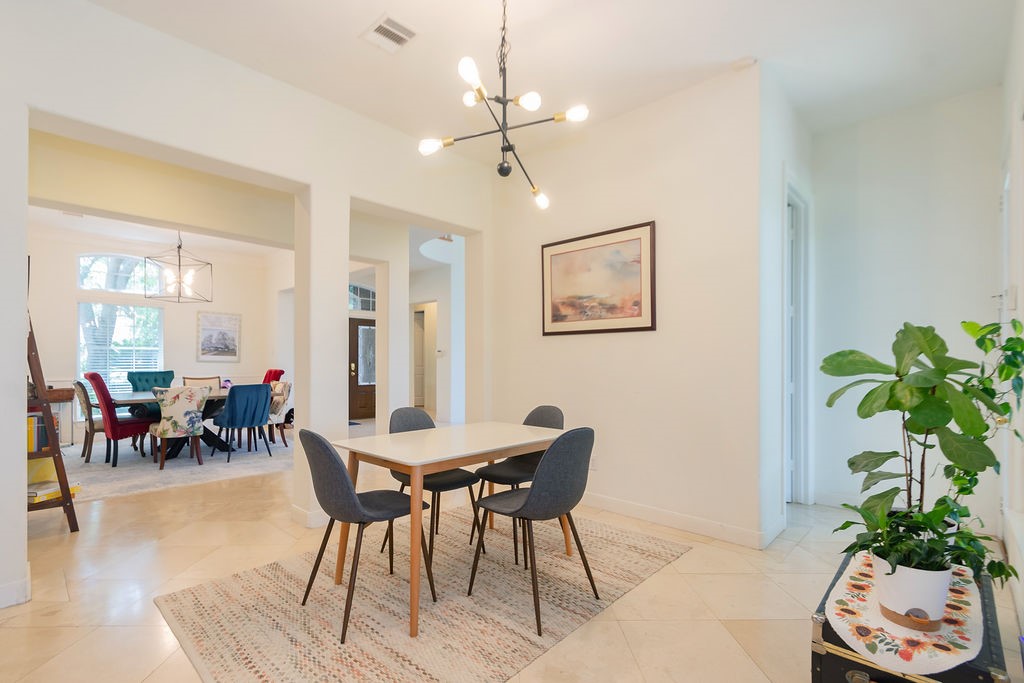 3011 Bonnebridge Way Boulevard Houston, TX 77082 - Photo 13 of 45 a view of a dining room with furniture window and wooden floor