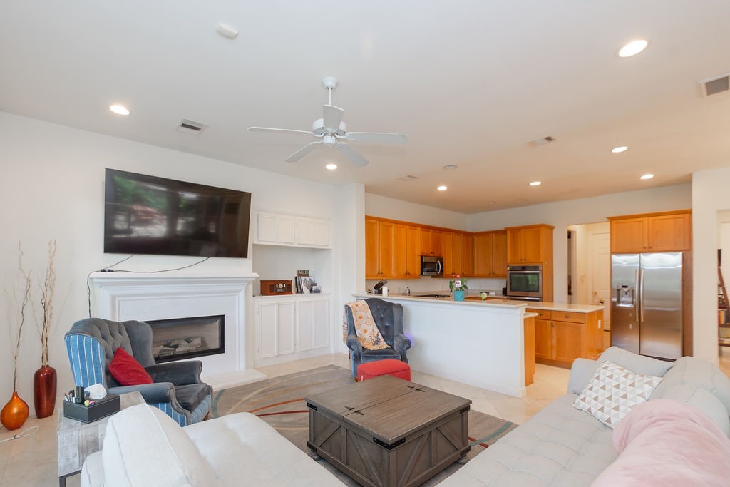 3011 Bonnebridge Way Boulevard Houston, TX 77082 - Photo 16 of 45 a living room with furniture and a flat screen tv