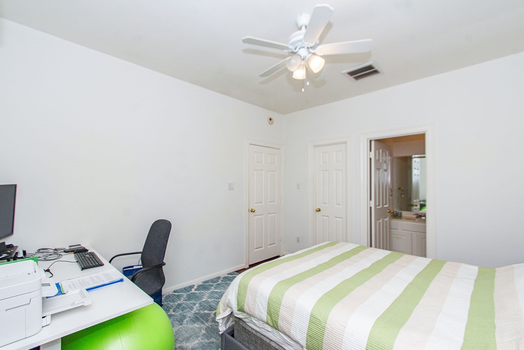 3011 Bonnebridge Way Boulevard Houston, TX 77082 - Photo 33 of 45 a bedroom with bed and a window