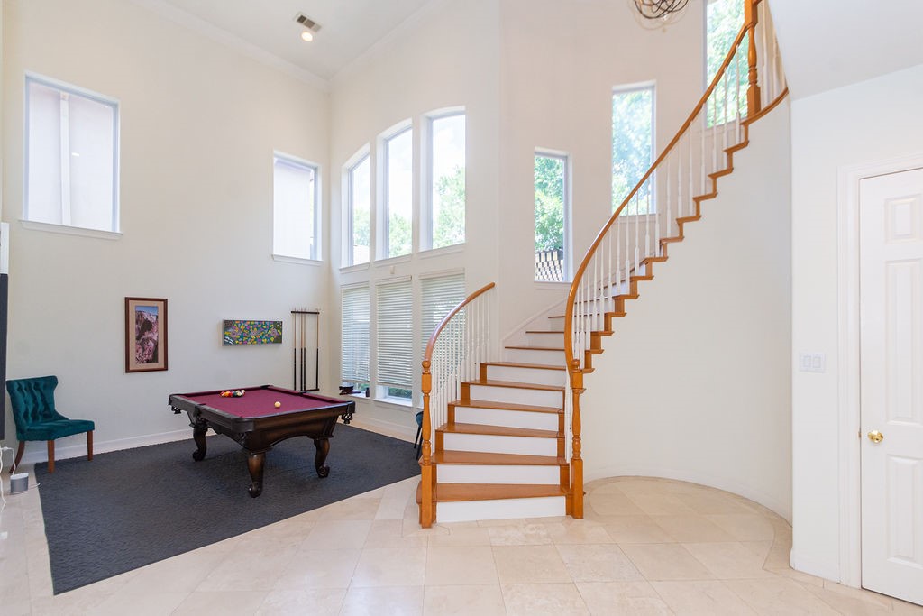 3011 Bonnebridge Way Boulevard Houston, TX 77082 - Photo 9 of 45 a living room with stairs and white walls