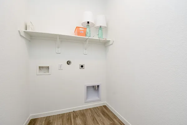 a view of small space with empty racks on the wall
