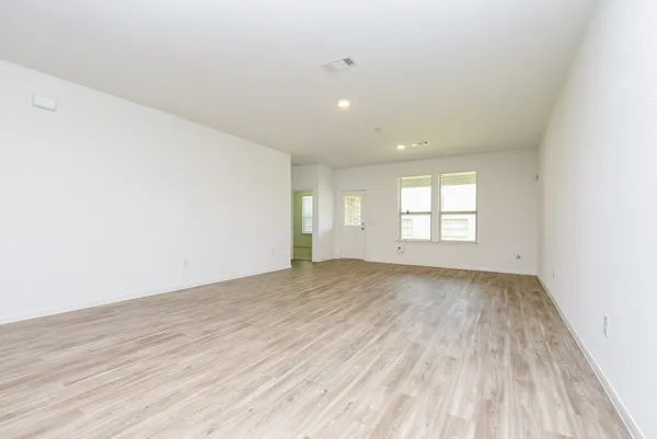 a view of an empty room and window