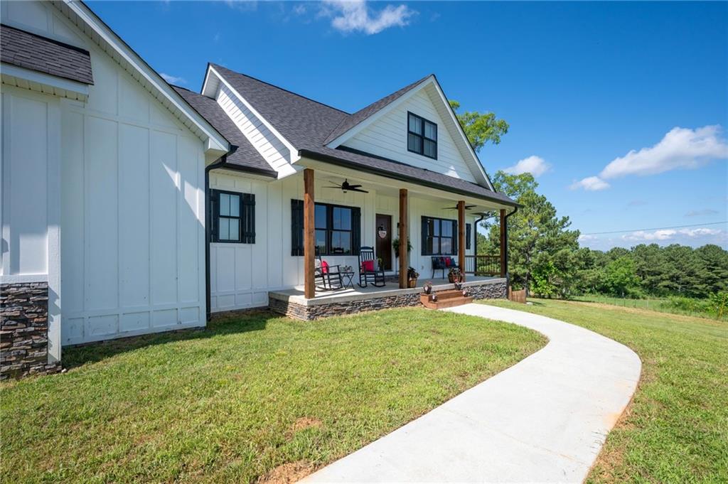 455 Poarch Farm Road Northeast Ranger, GA 30734 - Photo 13 of 93 a view of a house with a yard porch and furniture