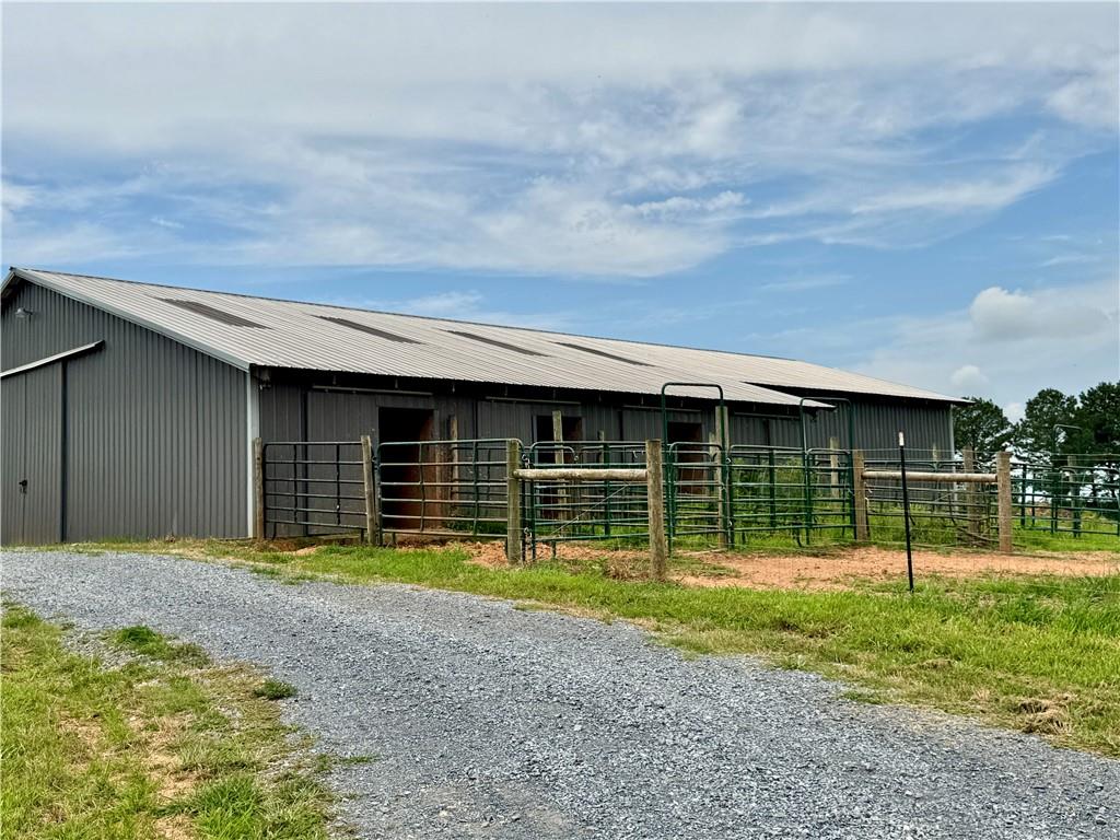 455 Poarch Farm Road Northeast Ranger, GA 30734 - Photo 16 of 93 a view of a house with backyard and trees