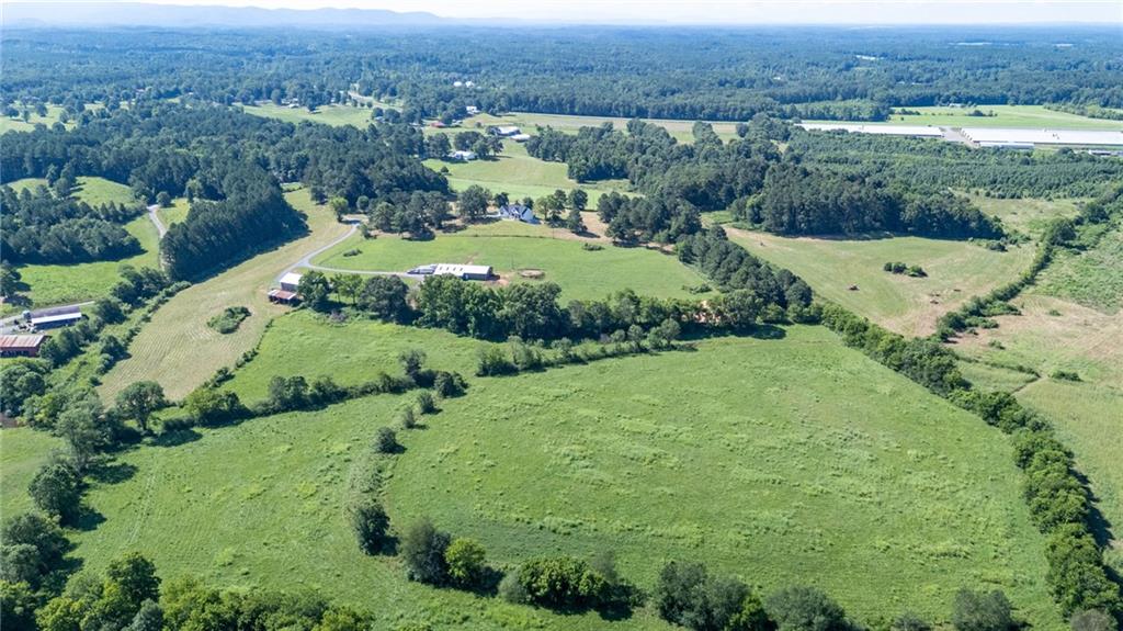 455 Poarch Farm Road Northeast Ranger, GA 30734 - Photo 23 of 93 an aerial view of residential houses with outdoor space and trees