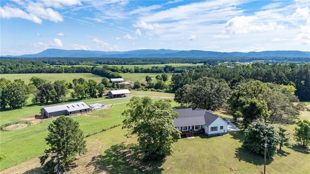 455 Poarch Farm Road Northeast Ranger, GA 30734 - Photo 30 of 93 an aerial view of a house with a garden