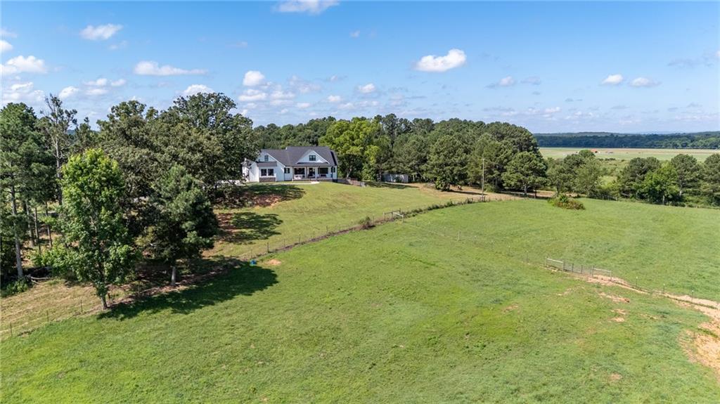 455 Poarch Farm Road Northeast Ranger, GA 30734 - Photo 32 of 93 a view of a big yard with swimming pool and green space