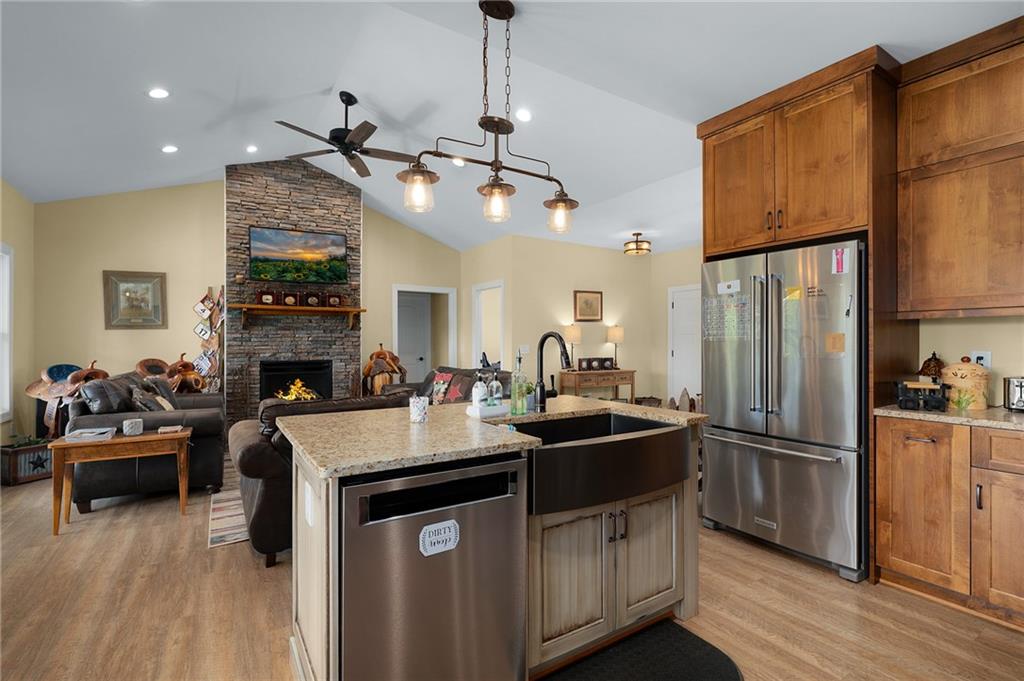 455 Poarch Farm Road Northeast Ranger, GA 30734 - Photo 53 of 93 a kitchen with kitchen island a counter top space a sink stainless steel appliances and cabinets