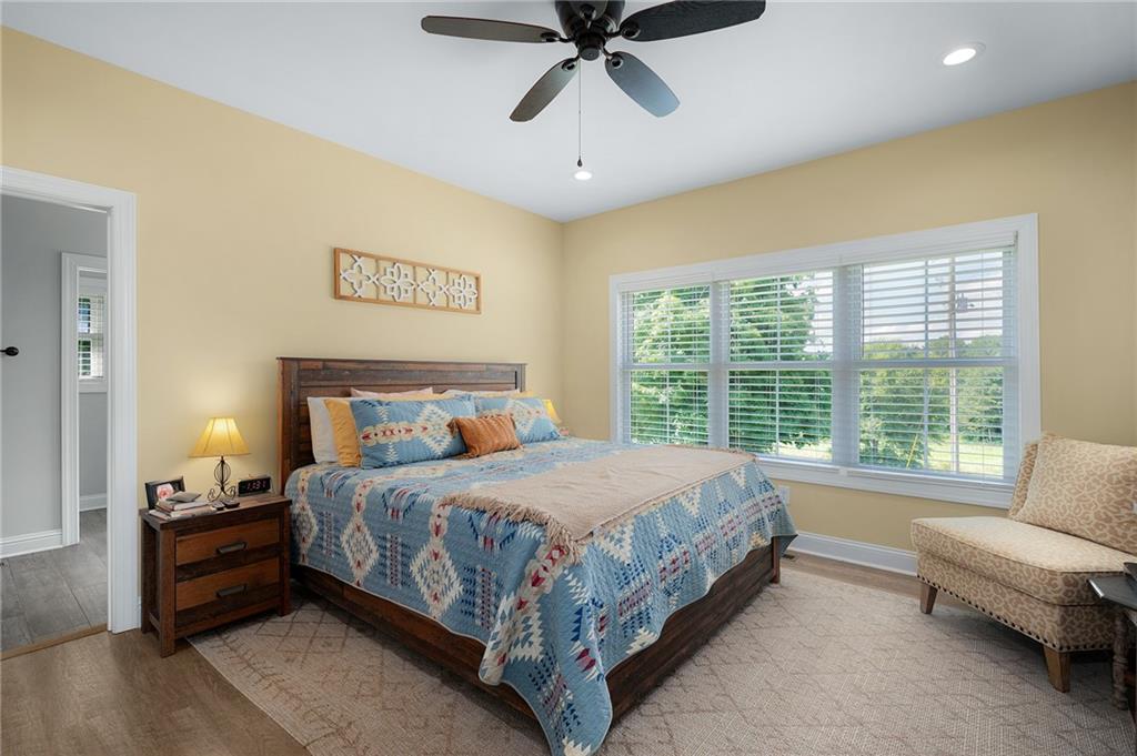 455 Poarch Farm Road Northeast Ranger, GA 30734 - Photo 70 of 93 a bedroom with a bed and a couch