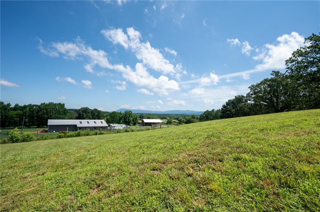 455 Poarch Farm Road Northeast Ranger, GA 30734 - Photo 85 of 93 a view of a lake with a big yard
