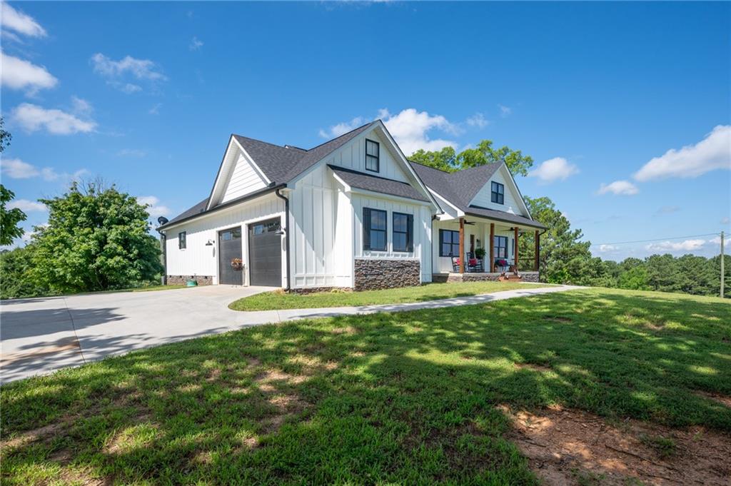 455 Poarch Farm Road Northeast Ranger, GA 30734 - Photo 9 of 93 a front view of a house with yard and green space