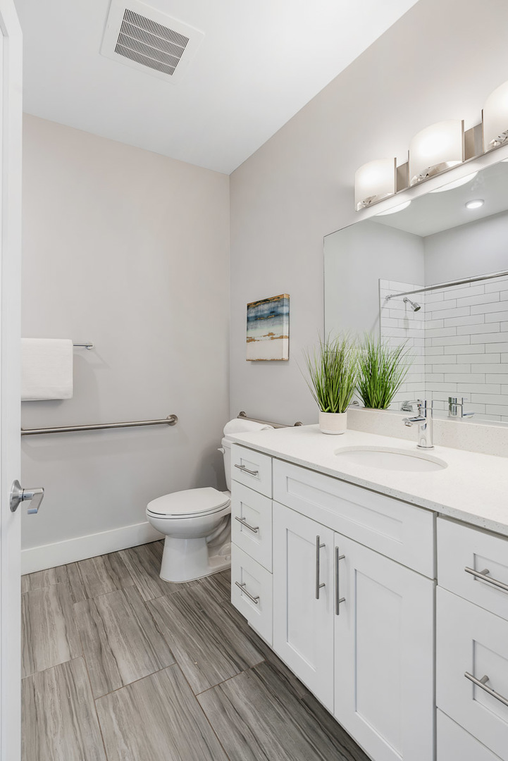 Undisclosed Address Barrington, IL 60010 - Photo 14 of 19 a bathroom with a toilet sink and mirror