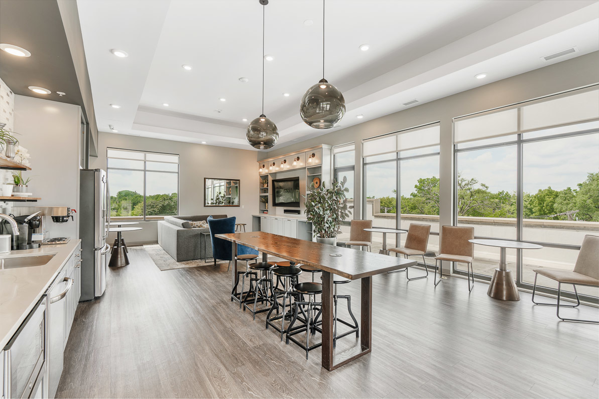 Undisclosed Address Barrington, IL 60010 - Photo 7 of 19 a view of a dining room and livingroom with furniture wooden floor a chandelier