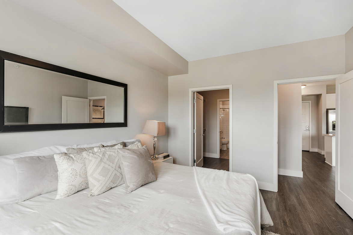 Undisclosed Address Barrington, IL 60010 - Photo 8 of 19 a bedroom with a bed and a large mirror
