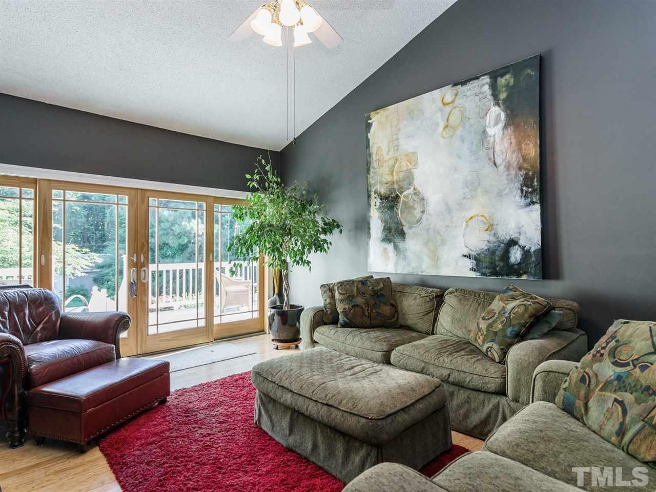 533 Rand Road Raleigh, NC 27603 - Photo 11 of 25 a living room with furniture and a large window