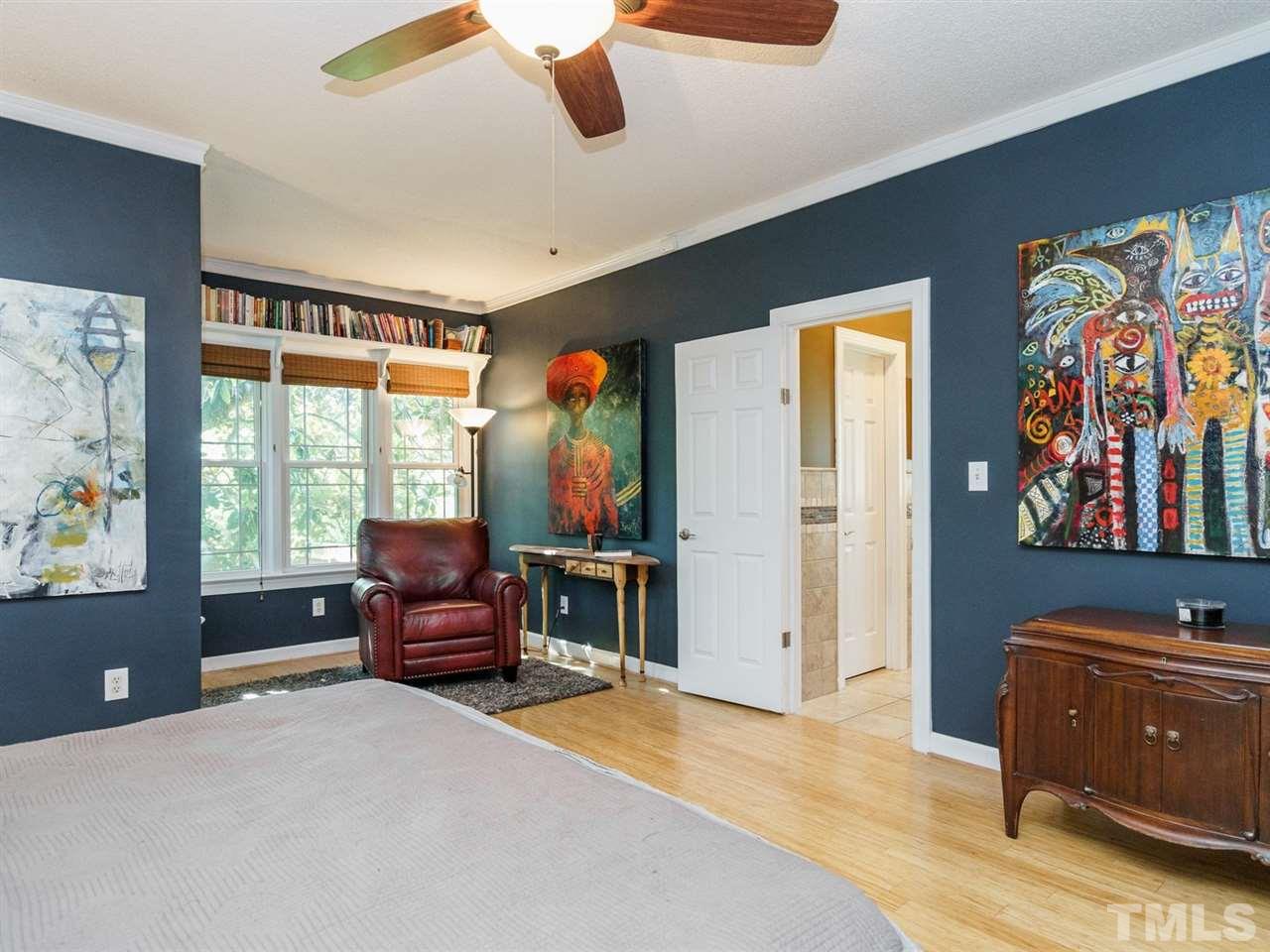 533 Rand Road Raleigh, NC 27603 - Photo 14 of 25 a bedroom with furniture and a window