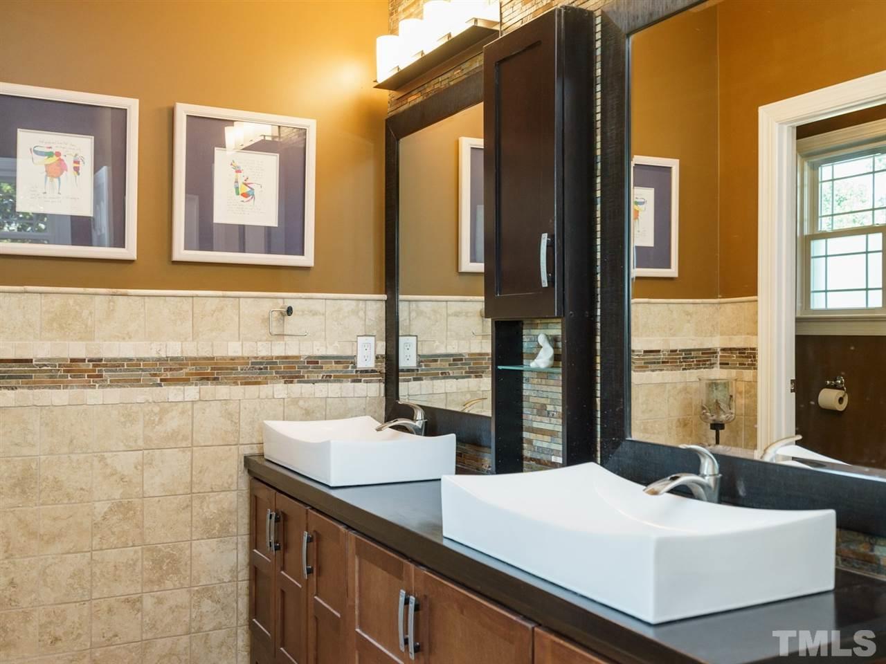533 Rand Road Raleigh, NC 27603 - Photo 15 of 25 a kitchen with a sink and a refrigerator