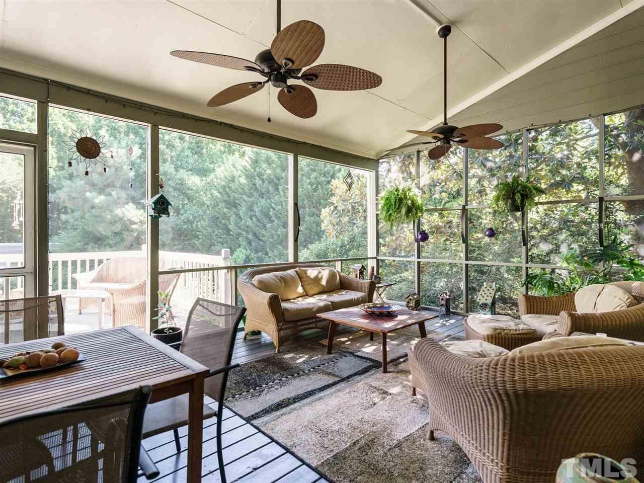 533 Rand Road Raleigh, NC 27603 - Photo 21 of 25 a living room with furniture and a large window