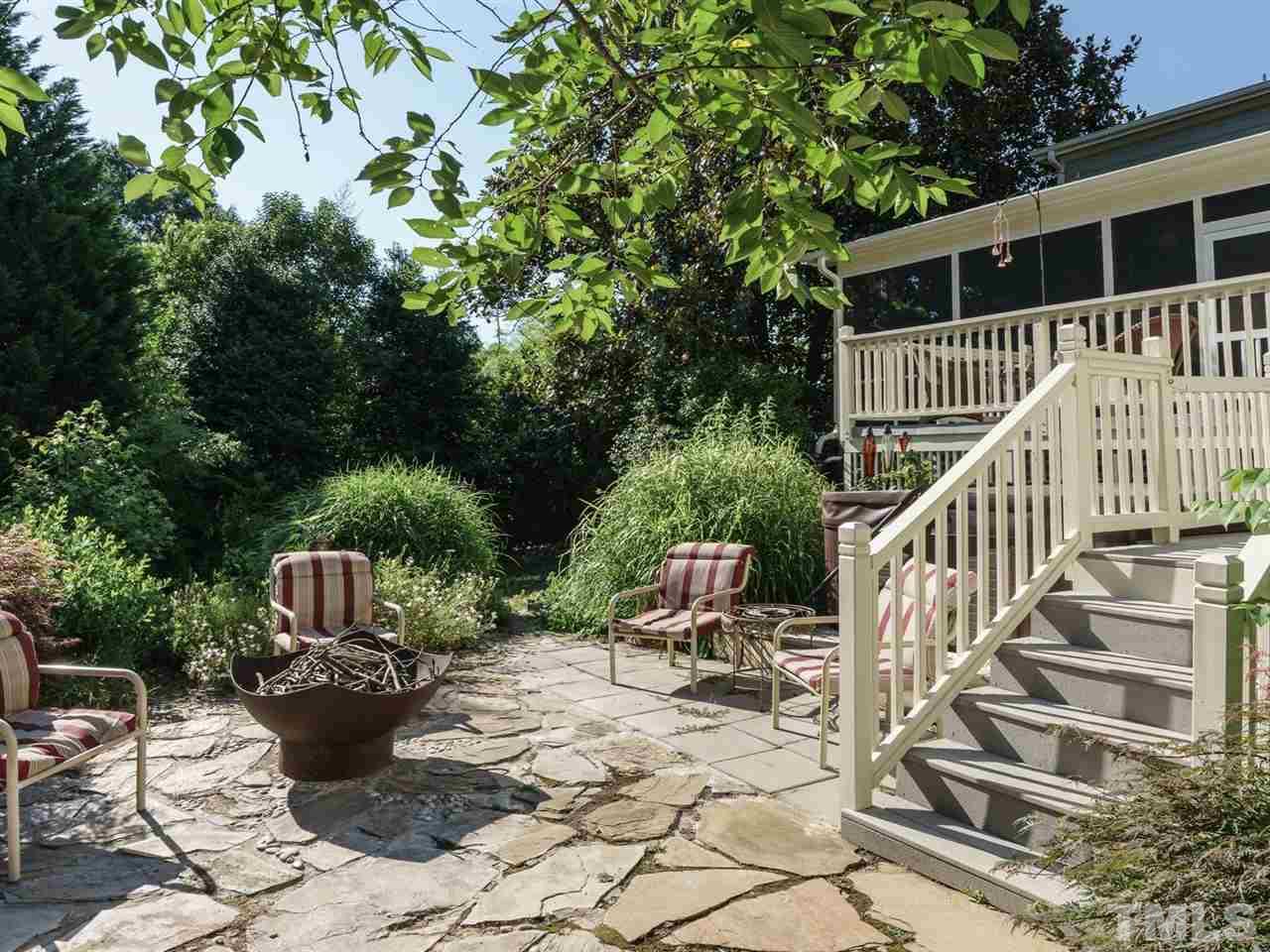 533 Rand Road Raleigh, NC 27603 - Photo 22 of 25 a view of a patio with a table and chairs