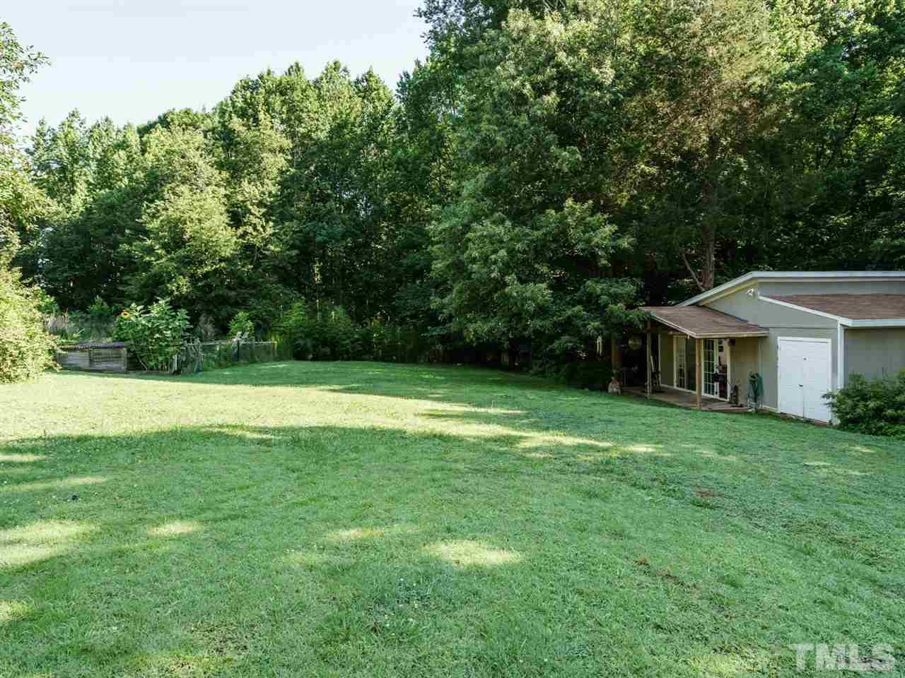 533 Rand Road Raleigh, NC 27603 - Photo 23 of 25 a view of a house with a backyard