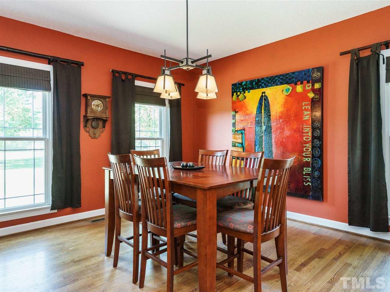 533 Rand Road Raleigh, NC 27603 - Photo 6 of 25 a view of a dining room with furniture window and wooden floor