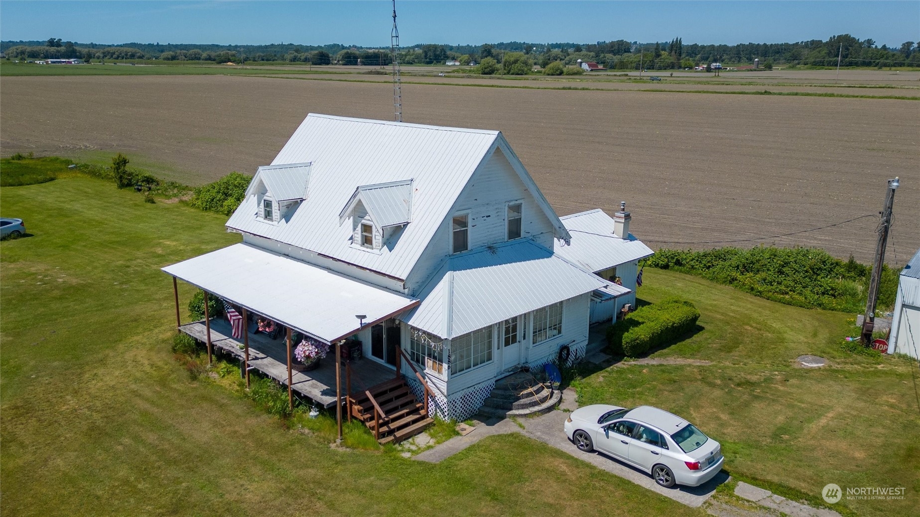 1886 Rayhorst Road Ferndale, WA 98248 - Photo 11 of 12 a aerial view of a house with a yard and lake view