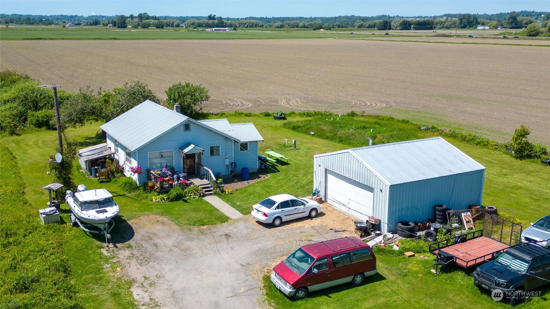 1886 Rayhorst Road Ferndale, WA 98248 - Photo 12 of 12 an aerial view of a house with garden space and lake view