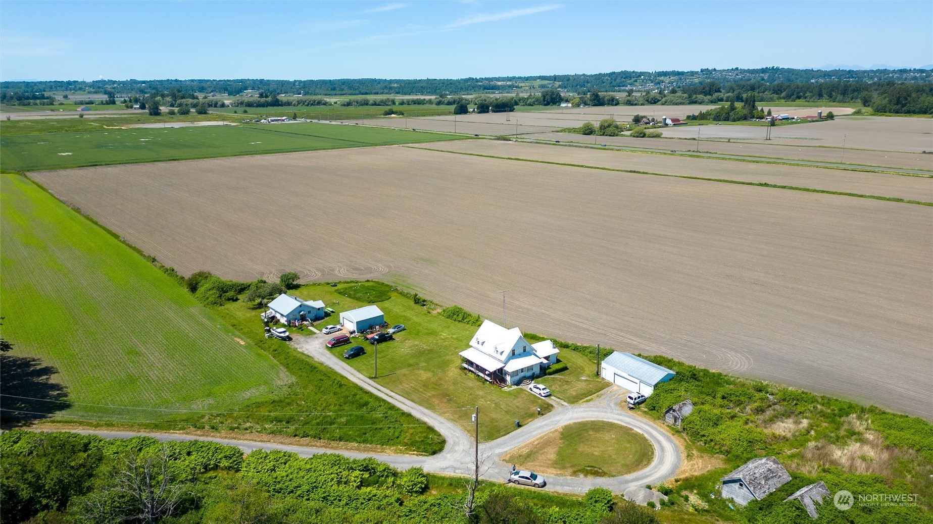 1886 Rayhorst Road Ferndale, WA 98248 - Photo 4 of 12 an aerial view of a golf course with a big yard