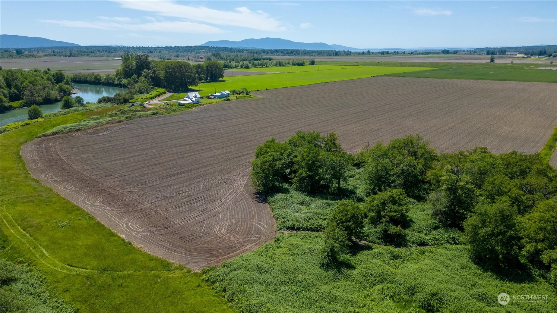 1886 Rayhorst Road Ferndale, WA 98248 - Photo 5 of 12 an aerial view of a house with a yard and lake view