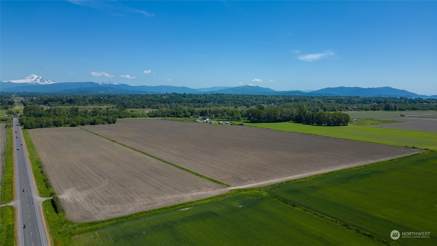 1886 Rayhorst Road Ferndale, WA 98248 - Photo 9 of 12 a view of a field with an ocean view
