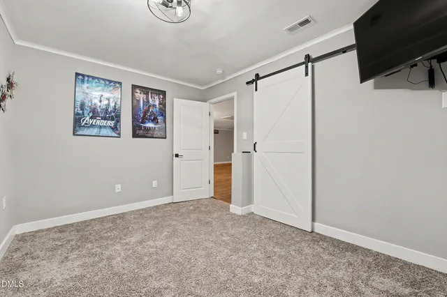 a backyard of a house with yard and seating space