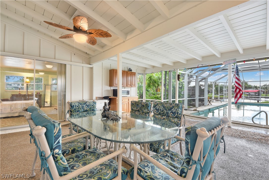 5970 Adele Court Fort Myers, FL 33919 - Photo 23 of 28 a view of a dining room with furniture window and outside view