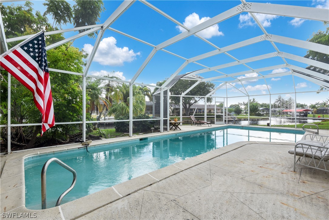 5970 Adele Court Fort Myers, FL 33919 - Photo 5 of 28 a view of a swimming pool with a patio