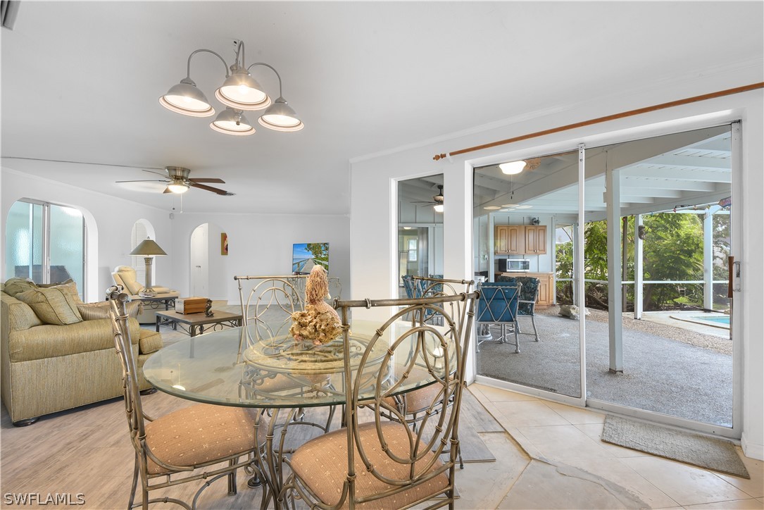 5970 Adele Court Fort Myers, FL 33919 - Photo 8 of 28 a view of a dining room and livingroom with furniture