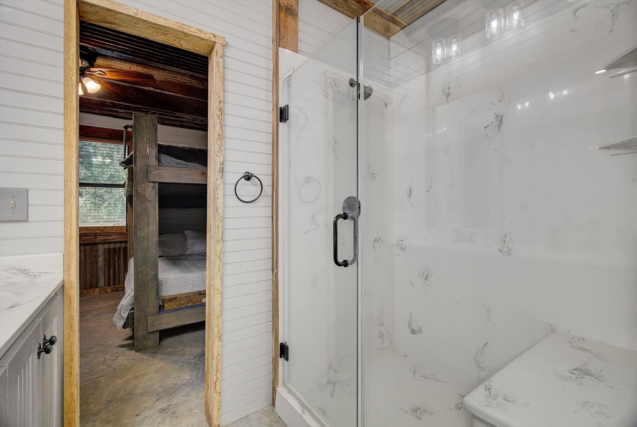 22546 Highway 321 Cleveland, TX 77327 - Photo 16 of 34 a bathroom with a shower