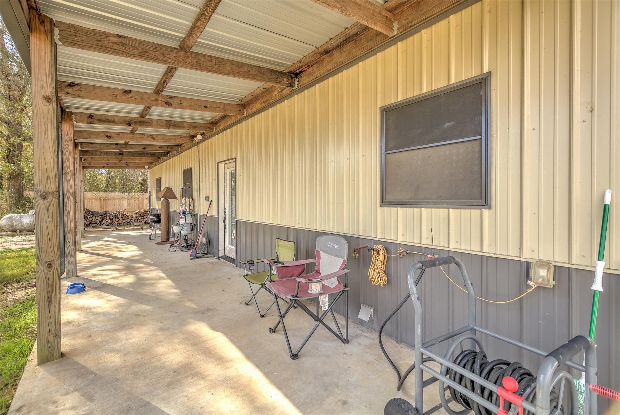 22546 Highway 321 Cleveland, TX 77327 - Photo 27 of 34 a outdoor space with furniture