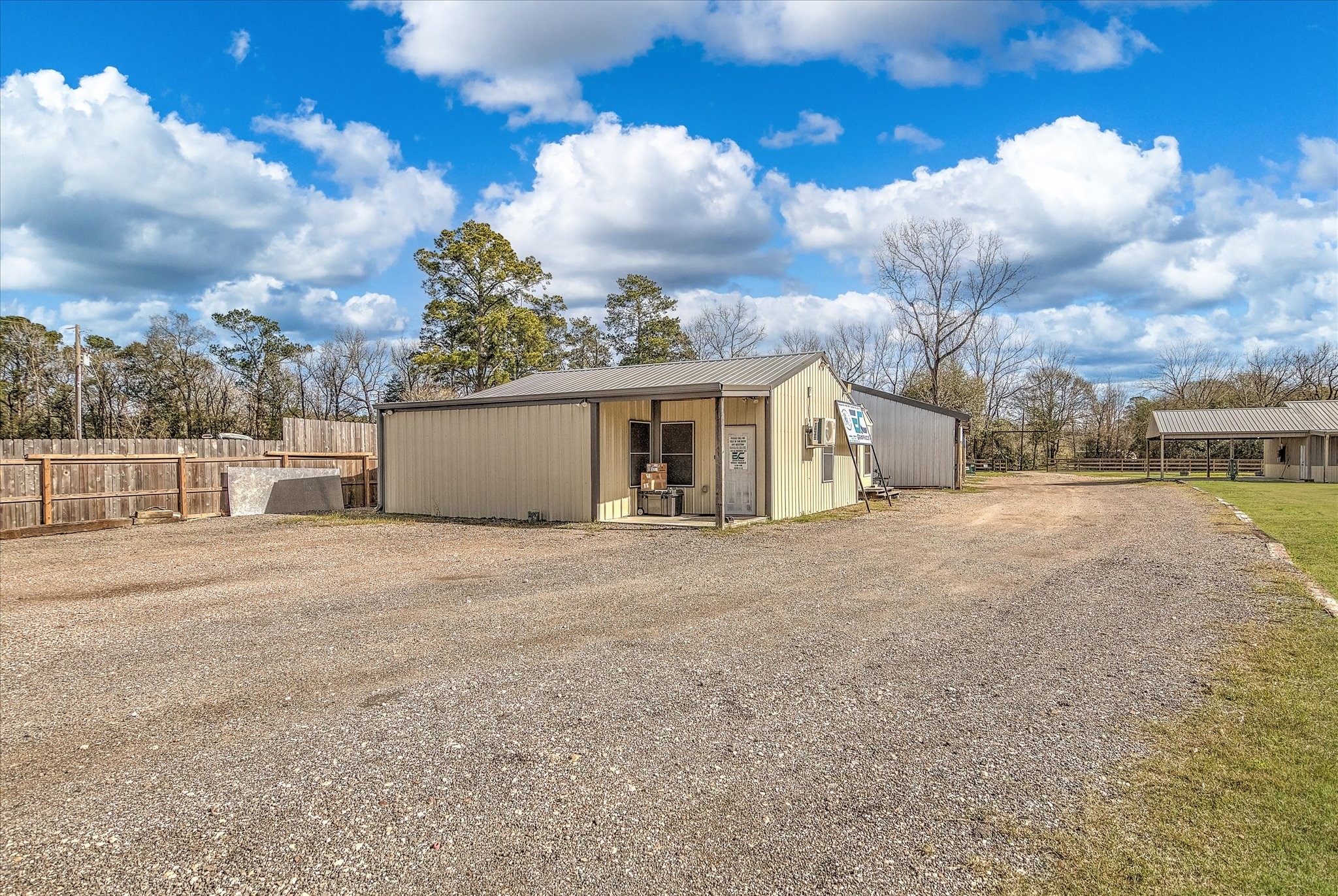 22546 Highway 321 Cleveland, TX 77327 - Photo 31 of 34 a view of large house with a yard