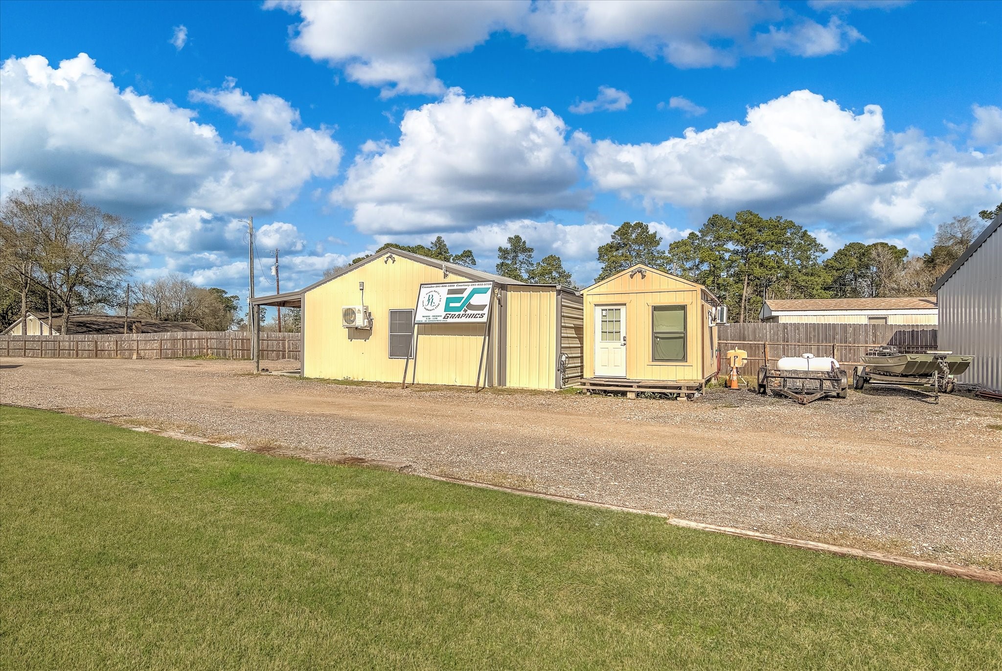 22546 Highway 321 Cleveland, TX 77327 - Photo 33 of 34 a view of a house with a yard