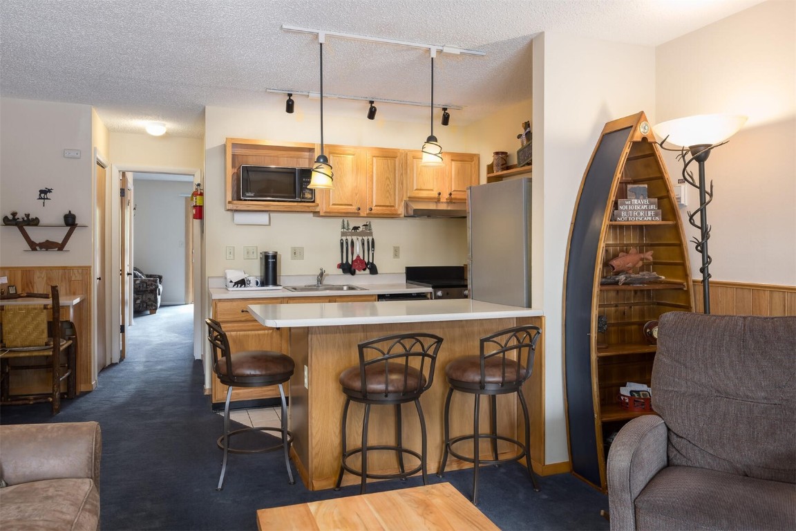 1513 East Keystone Road, Unit 2963 Keystone, CO 80435 - Photo 5 of 37 Kitchen with stainless steel appliances