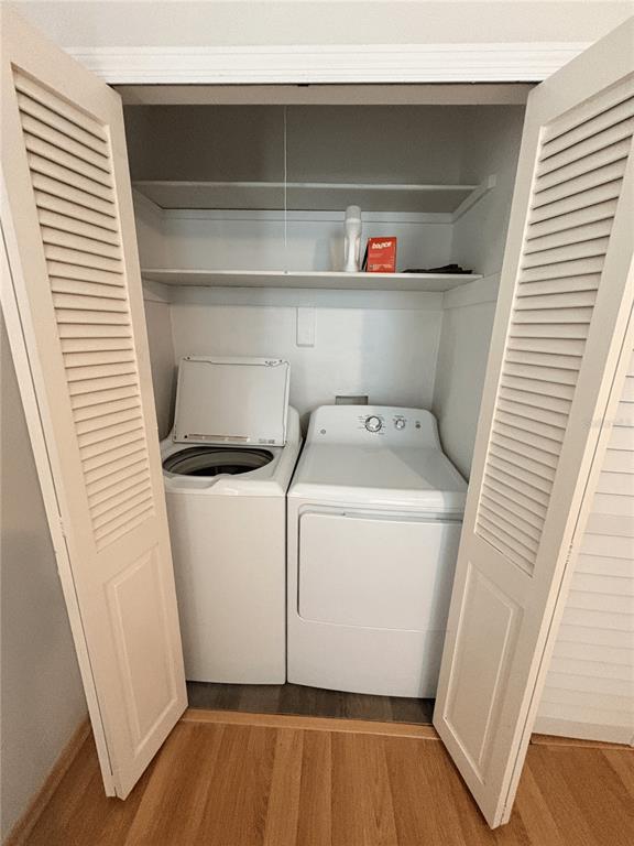 6693 Engram Road New Smyrna Beach, FL 32169 - Photo 5 of 18 a utility room with dryer and washer