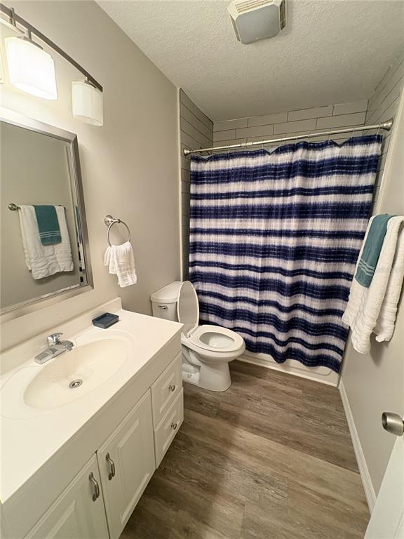 6693 Engram Road New Smyrna Beach, FL 32169 - Photo 7 of 18 a bathroom with a sink and a mirror