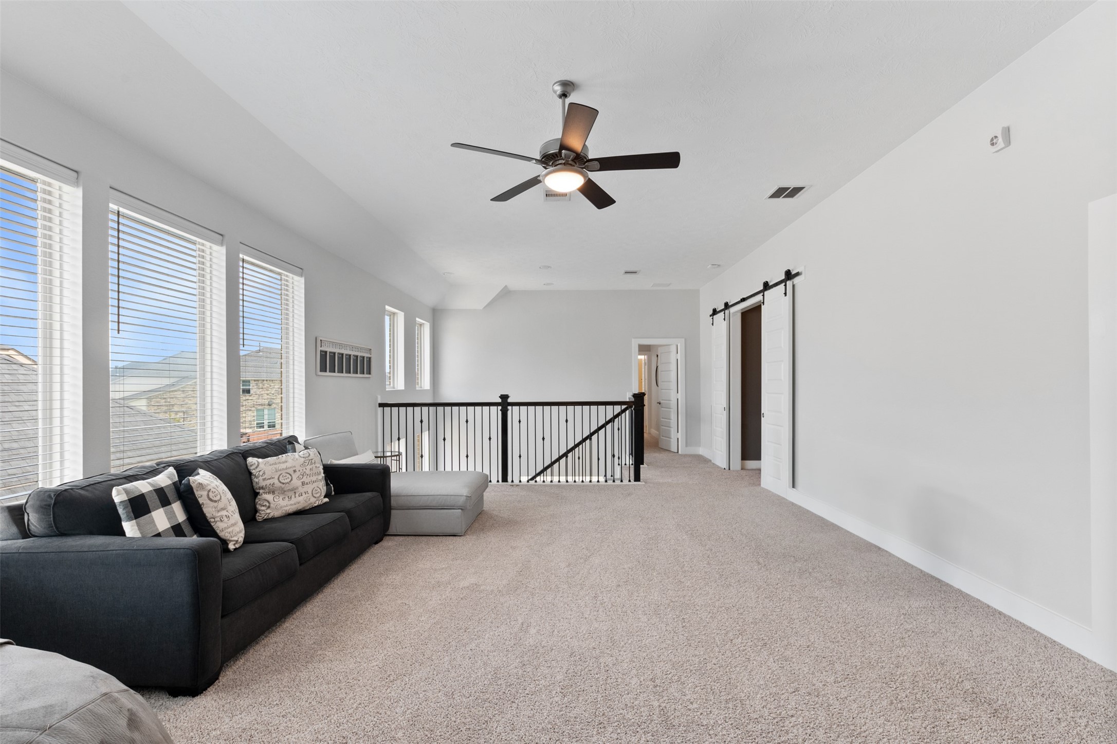 1102 McMurtry Ridge Drive Katy, TX 77494 - Photo 24 of 41 a living room with furniture and a window