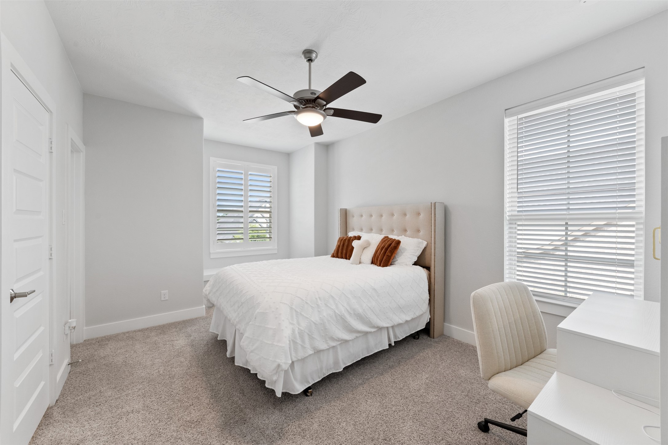 1102 McMurtry Ridge Drive Katy, TX 77494 - Photo 25 of 41 a bedroom with a bed and a chair