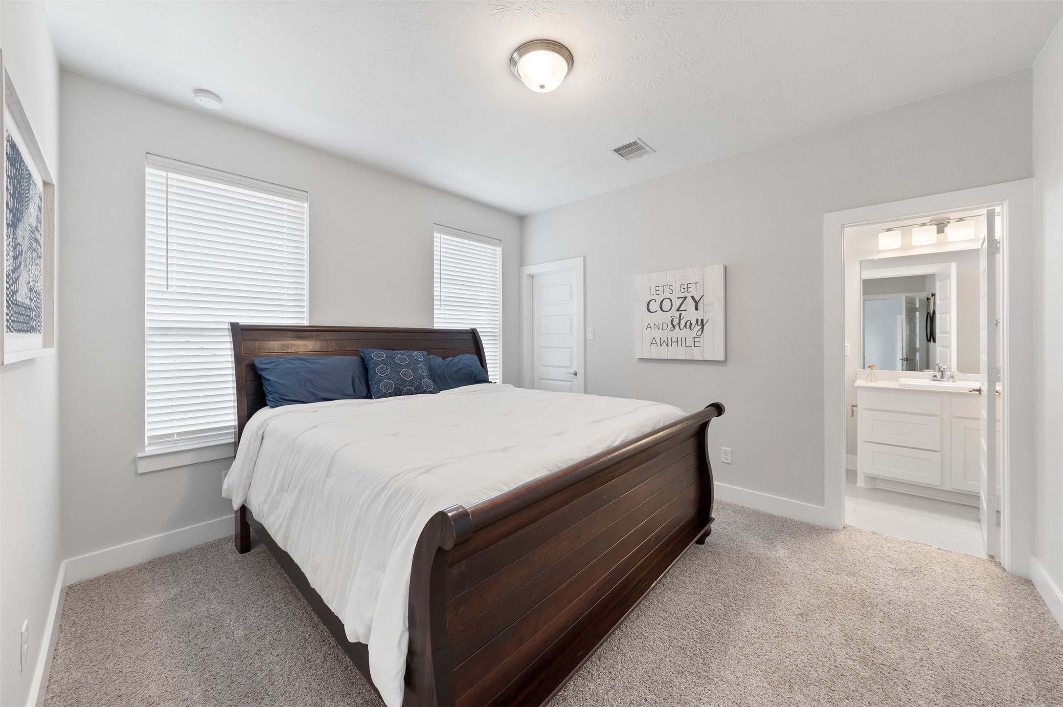 1102 McMurtry Ridge Drive Katy, TX 77494 - Photo 29 of 41 a bedroom with a bed and a window