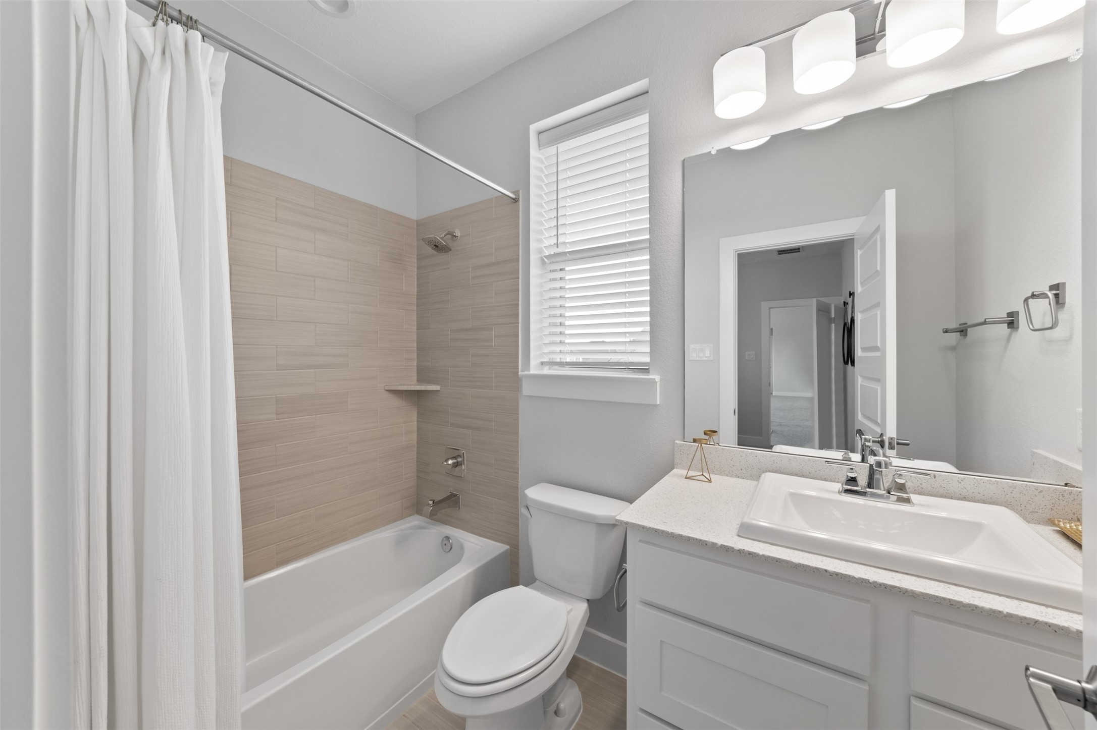 1102 McMurtry Ridge Drive Katy, TX 77494 - Photo 30 of 41 a bathroom with a sink a toilet and shower