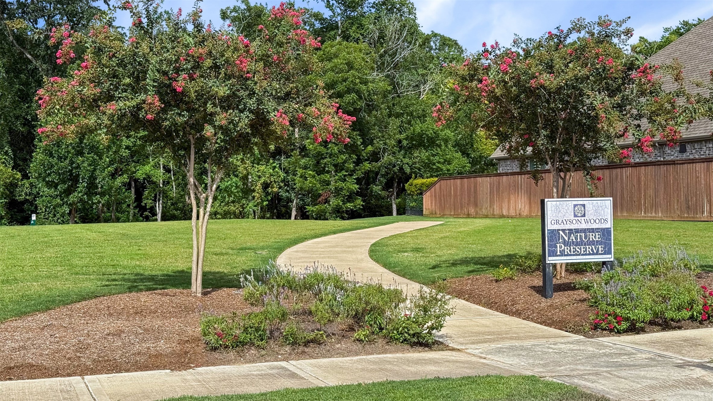 1102 McMurtry Ridge Drive Katy, TX 77494 - Photo 34 of 41 a sign board with a park bench