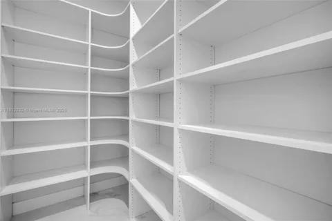 a spacious bathroom with a large tub shower and sink