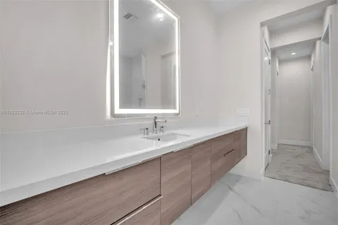 a bathroom with a sink and a toilet